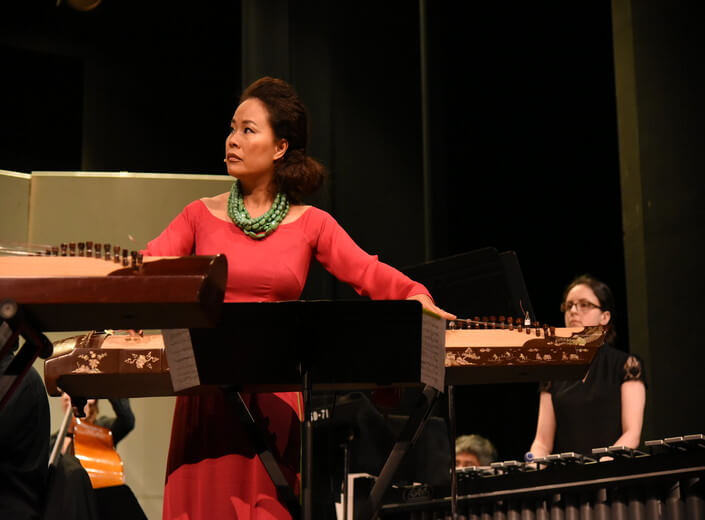 woman playing keyboard