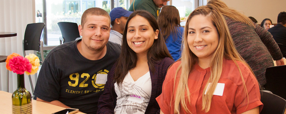 3 smiling students